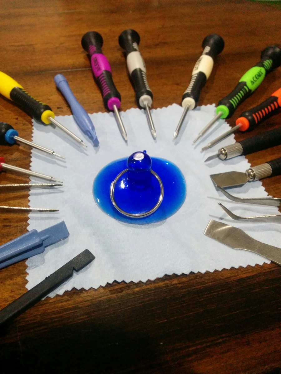 Suction cup for servicing a phone + security via obfuscation.jpg